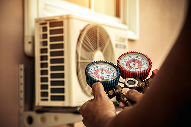 Professional Air Conditioning Service technician working in Teterboro, NJ
